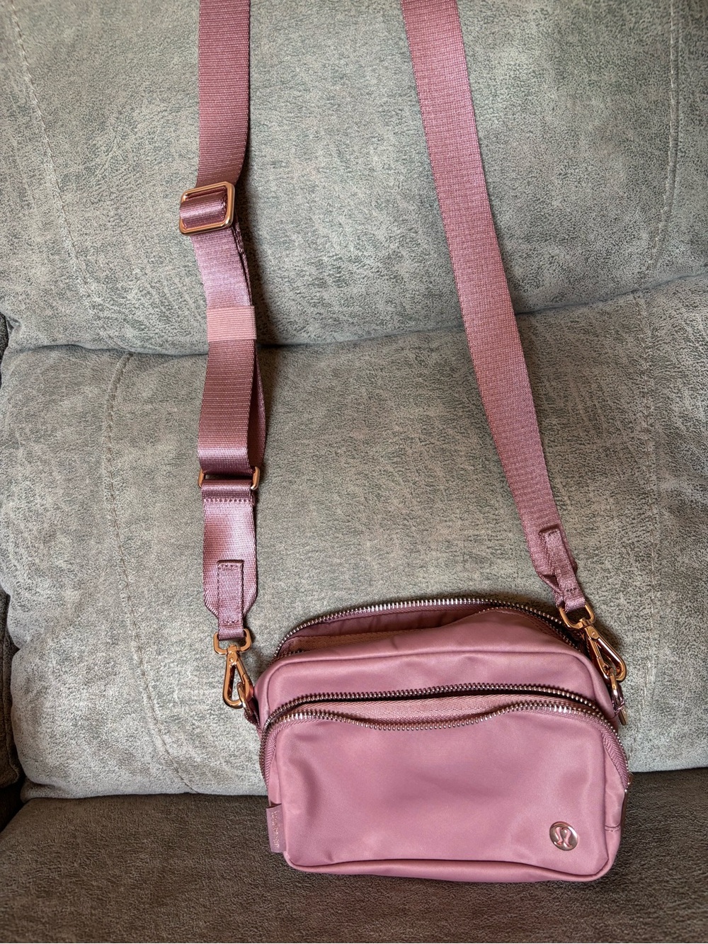 Lululemon Pink (mauve) Crossbody 2L bag with rose gold hardware